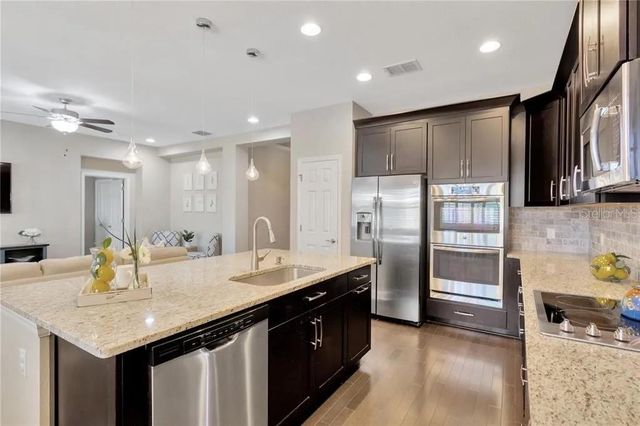 1607 FEATHER GRASS LOOP, Lutz, FL 33558