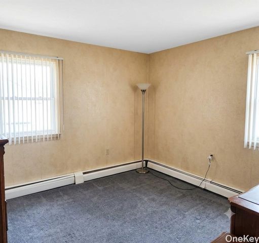 89 Woodycrest Drive, Farmingville, NY 11738
