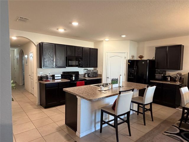 1451 TAOS AVENUE, Kissimmee, FL 34744