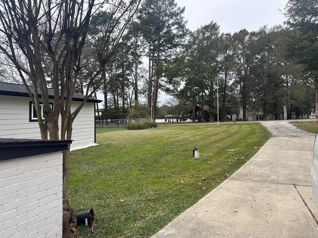 15124 Cozy Cove Lane, Willis, TX 77318