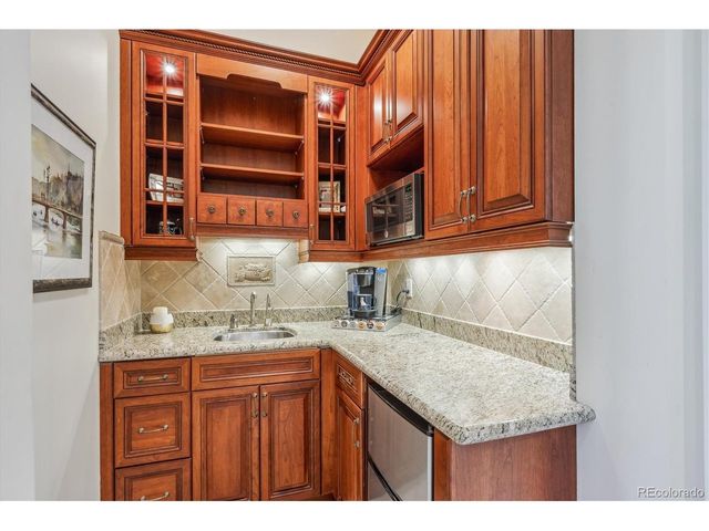 8717 Ridgepointe Dr, Castle Pines, CO 80108