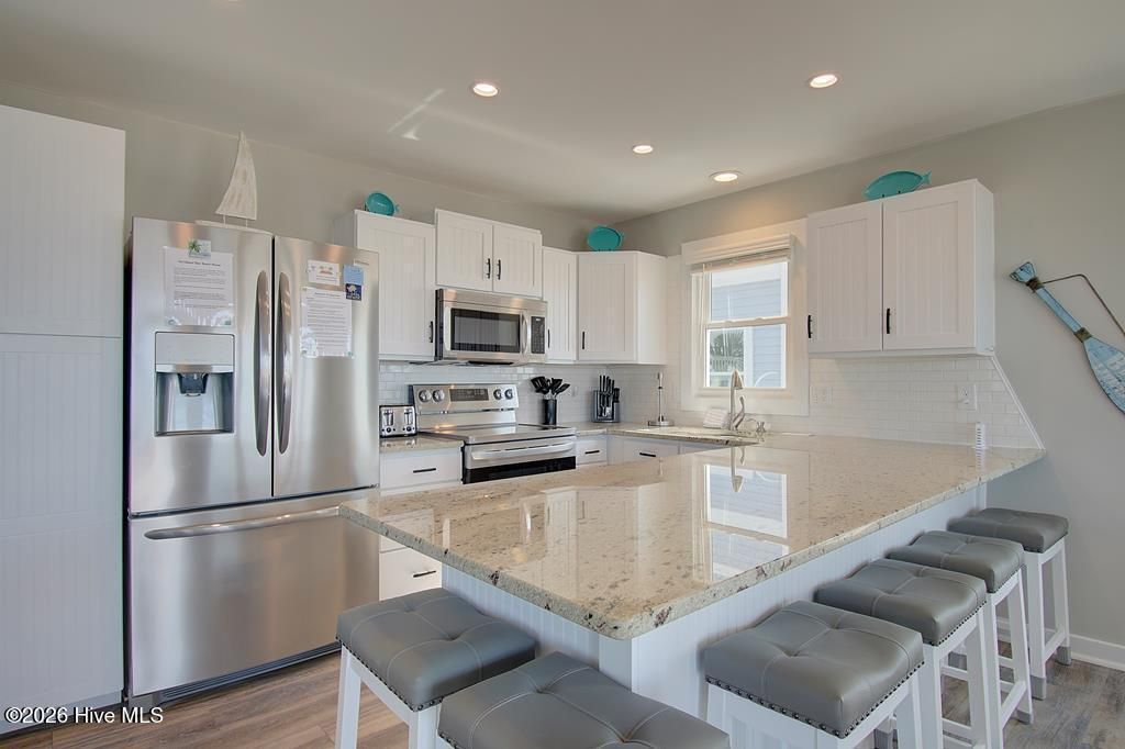 Image 16 of property listing at 209 W Beach Drive, Oak Island, NC 28465