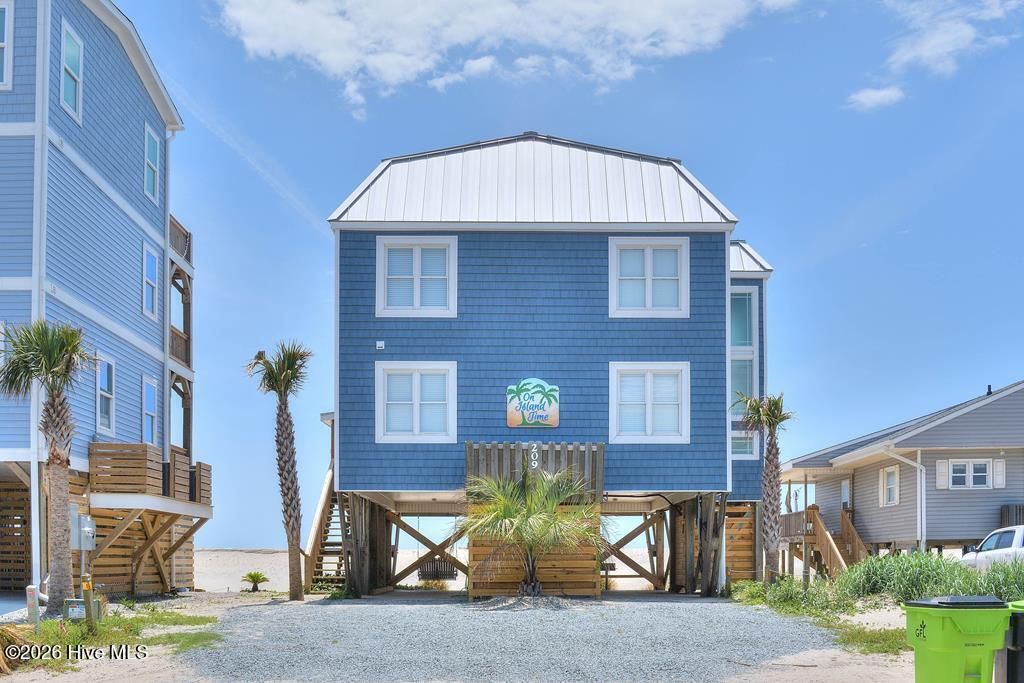 Image 3 of property listing at 209 W Beach Drive, Oak Island, NC 28465