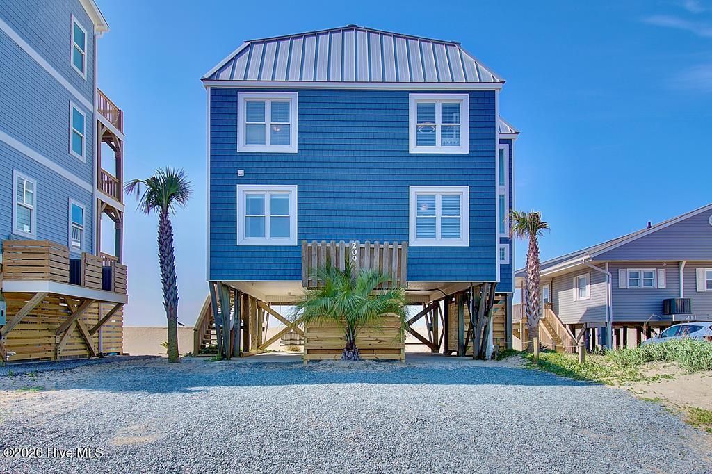 Image 4 of property listing at 209 W Beach Drive, Oak Island, NC 28465