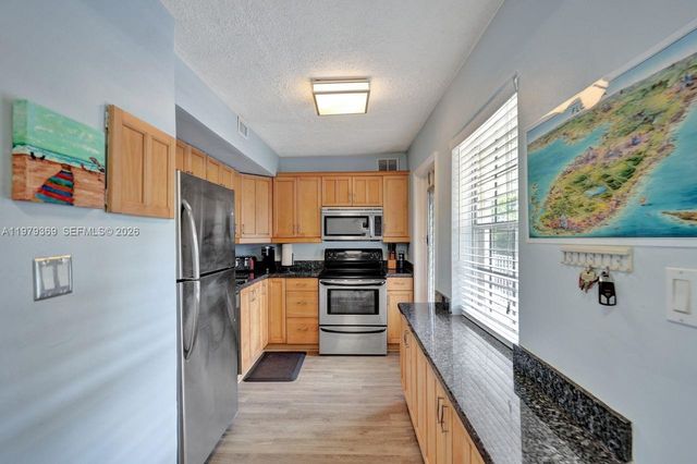 2651 S Course Drive 203, Pompano Beach, FL 33069