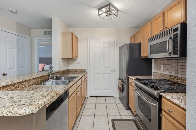 930 MOONLIGHT COVE ROAD 11-107, Orange City, FL 32763