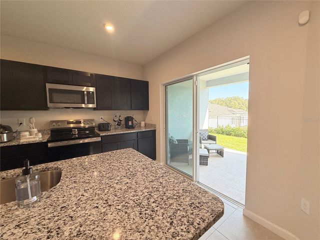 1204 PORT BLUE WAY, Lady Lake, FL 32159