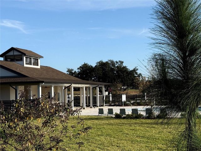 1204 PORT BLUE WAY, Lady Lake, FL 32159