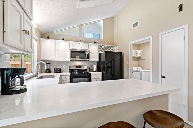 9 Brentwood Oaks Court, Spring, TX 77381