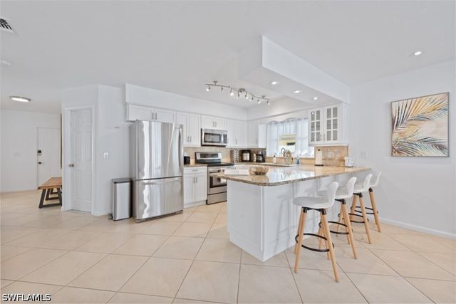 575 97th AVE N, Naples, FL 34108