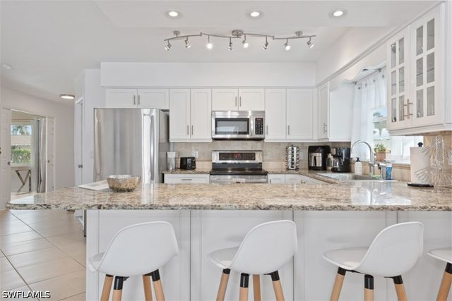 575 97th AVE N, Naples, FL 34108
