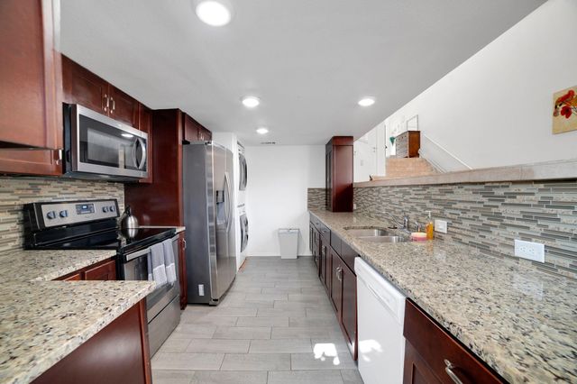 1 Crystal Springs Court CT H, The Hills, TX 78738