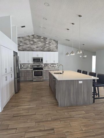 501 SW Fifer Avenue, Port St. Lucie, FL 34953