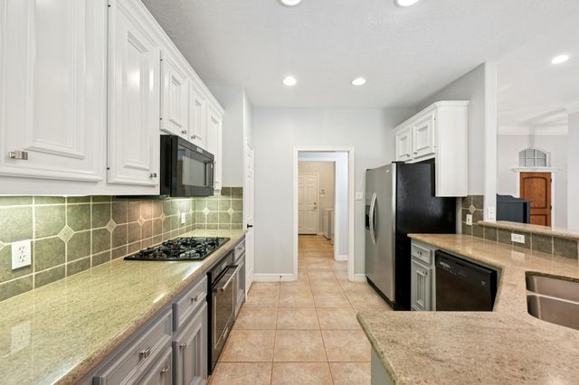 7187 Edgewater Drive, Willis, TX 77318