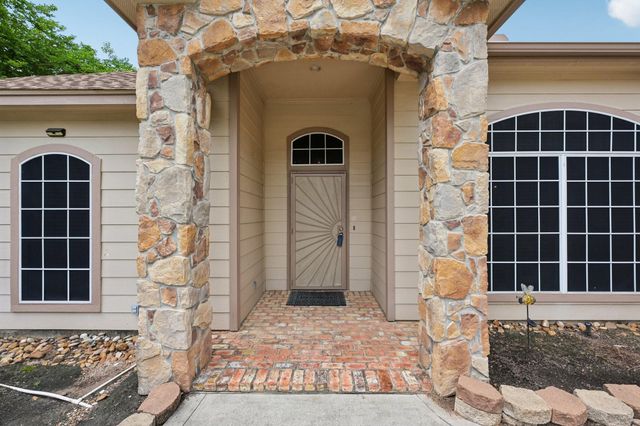 7187 Edgewater Drive, Willis, TX 77318