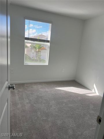 19550 Fairhill CT, Lehigh Acres, FL 33974