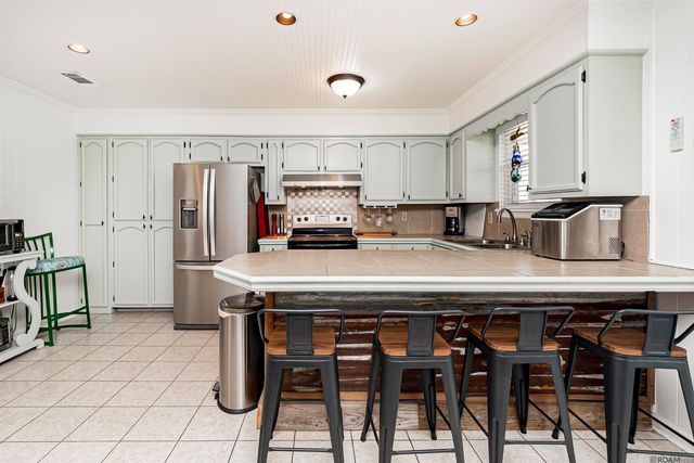 8016 False River Rd, Oscar, LA 70762