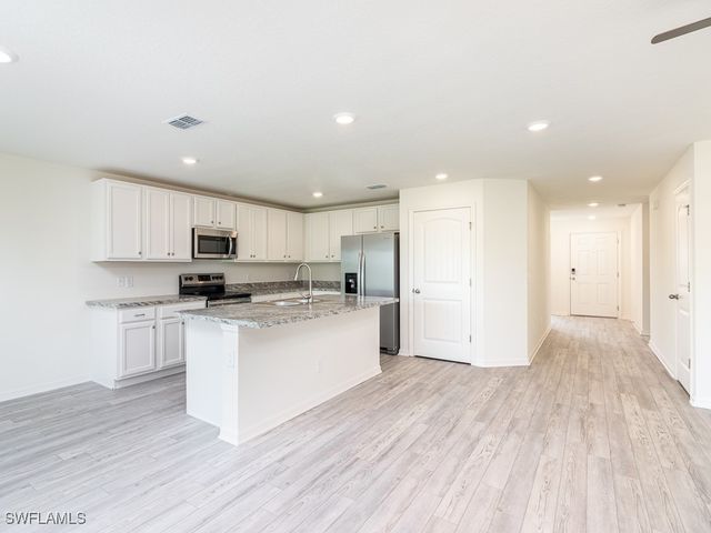 1125 Jacaranda PKY E, Cape Coral, FL 33909