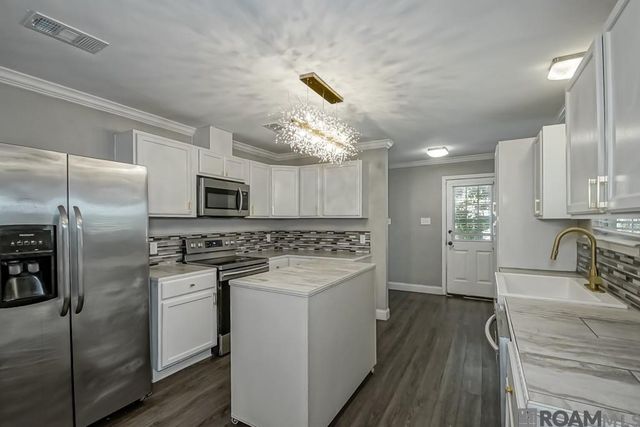 9493 Gene Buckle Ave, Denham Springs, LA 70726