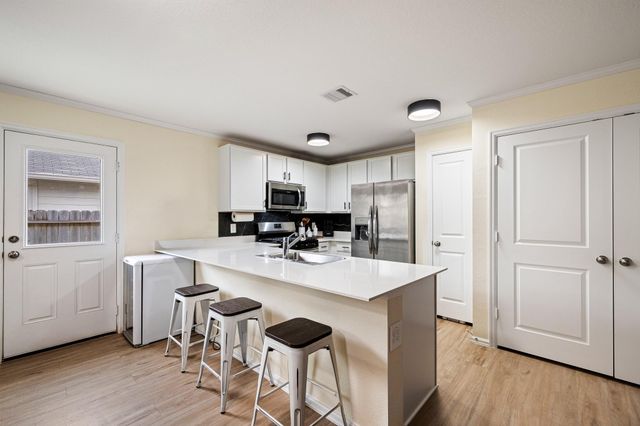 760 Hackberry Branch Court, Magnolia, TX 77354