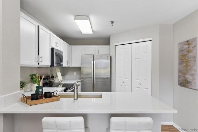 2575 S SYRACUSE Way 101, Denver, CO 80231