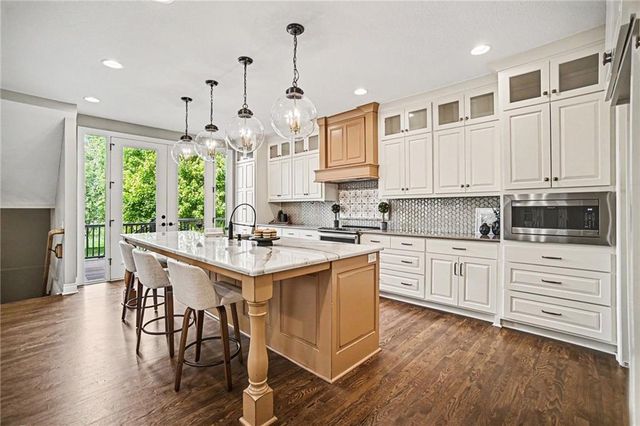 808 Creekmoor Pond Lane, Raymore, MO 64083