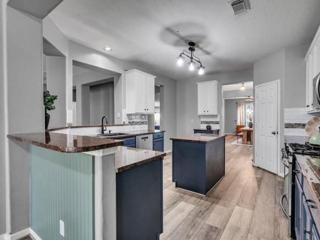 17726 Creek Bluff Lane, Cypress, TX 77433