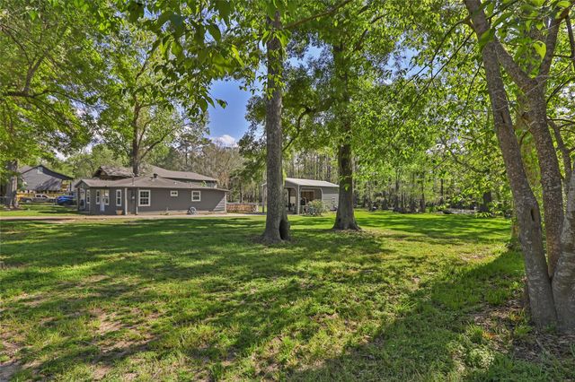 218 Waterfall Drive, Huffman, TX 77336