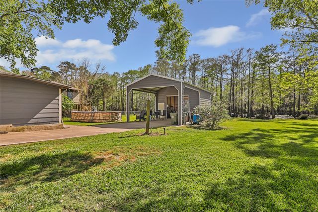 218 Waterfall Drive, Huffman, TX 77336