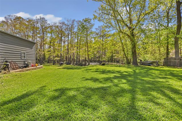 218 Waterfall Drive, Huffman, TX 77336