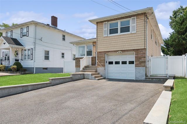 83 Scarcliffe Drive, Malverne, NY 11565