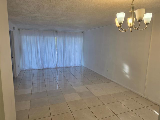 661 N UNIVERSITY Drive 1-104, Pembroke Pines, FL 33024