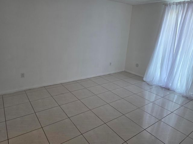 661 N UNIVERSITY Drive 1-104, Pembroke Pines, FL 33024