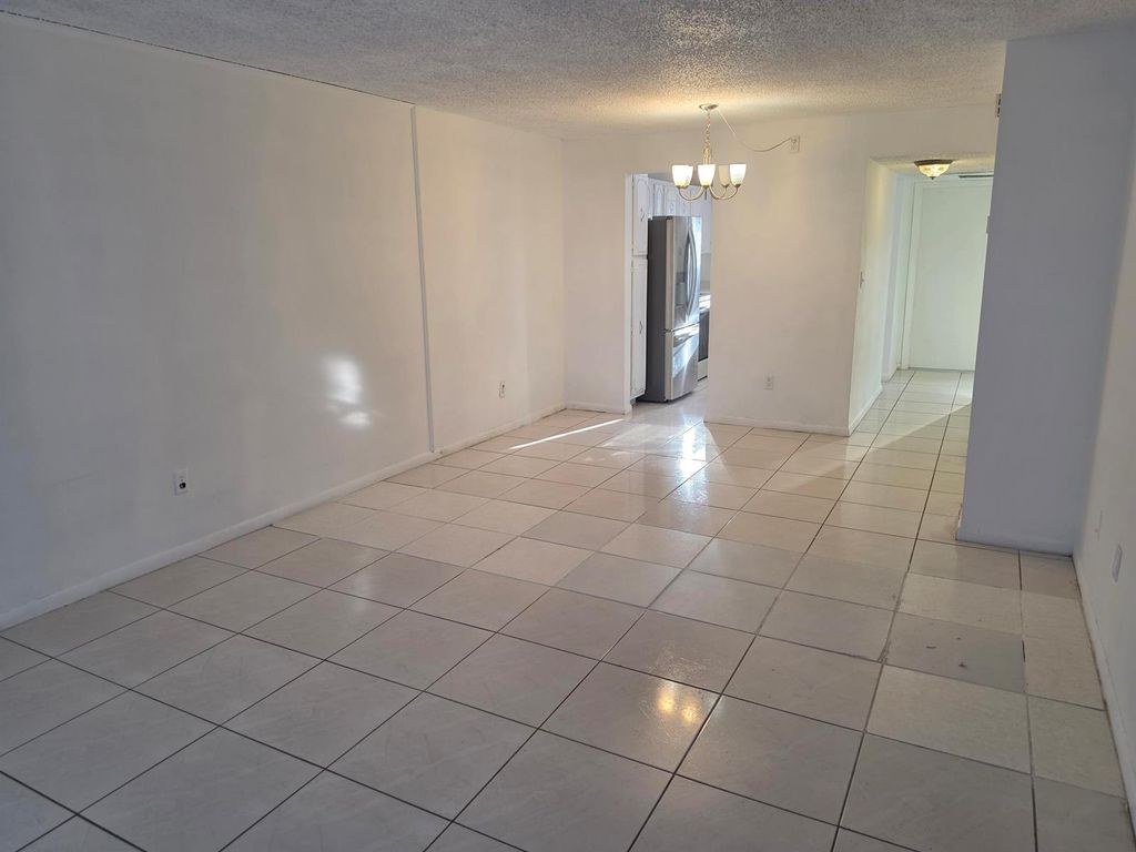 661 N UNIVERSITY Drive 1-104, Pembroke Pines, FL 33024
