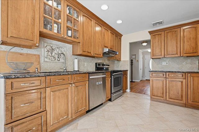 698 Edgewood Drive, Westbury, NY 11590