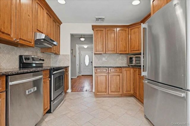 698 Edgewood Drive, Westbury, NY 11590