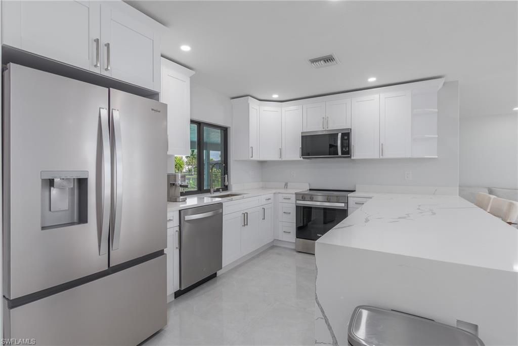 Image 8 of property listing at 233 11th TER, Cape Coral, FL 33993