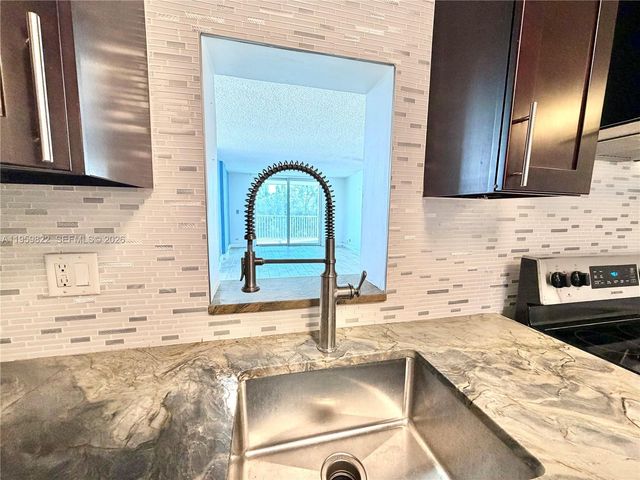 3660 NE 166th St 301 +40' Deeded Dock, North Miami Beach, FL 33160