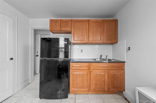 126-19 Sutter Avenue, South Ozone Park, NY 11420