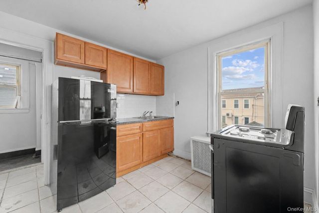 126-19 Sutter Avenue, South Ozone Park, NY 11420