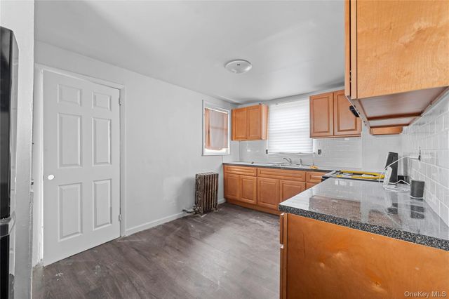 126-19 Sutter Avenue, South Ozone Park, NY 11420