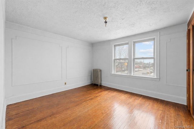 126-19 Sutter Avenue, South Ozone Park, NY 11420