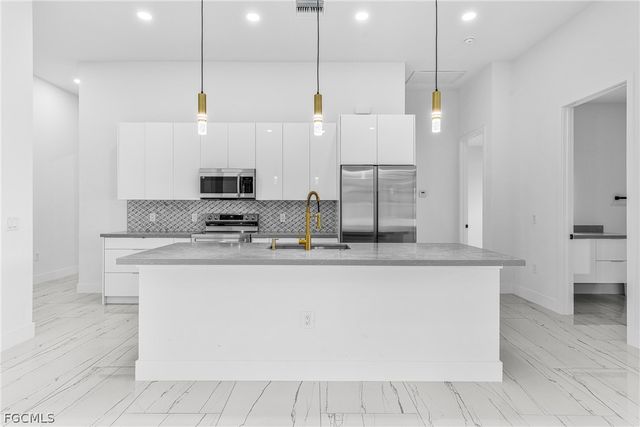 4112 2nd ST SW, Lehigh Acres, FL 33976