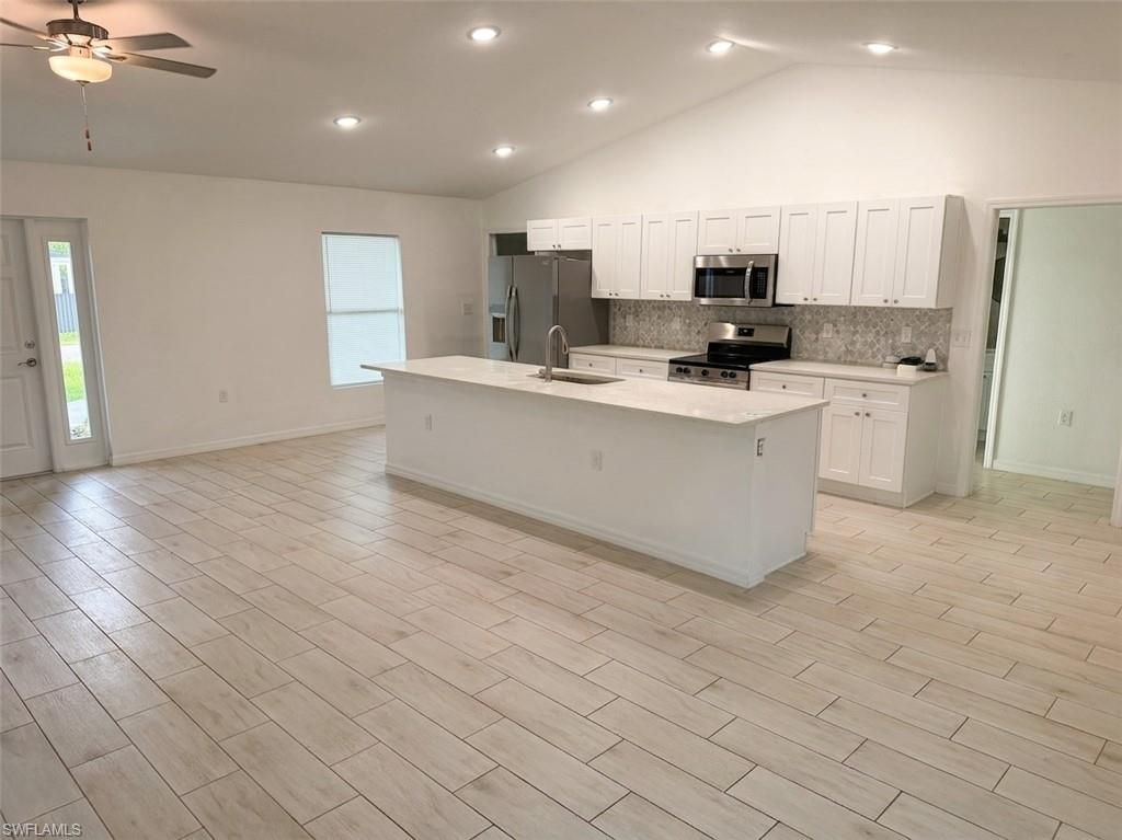 1825 NE 36th LN, CAPE CORAL, FL 33909 — photo 5