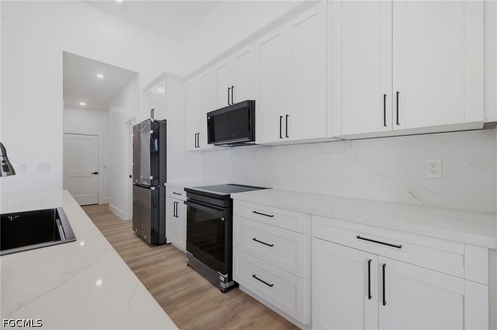 Image 15 of property listing at 3106 NW 14th TER, Cape Coral, FL 33993