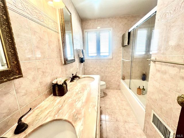 728 Arbuckle Avenue, Woodmere, NY 11598