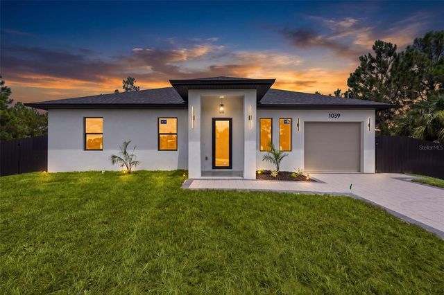 1039 BASSINGER AVENUE S, Lehigh Acres, FL 33974