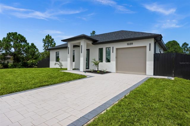 1039 BASSINGER AVENUE S, Lehigh Acres, FL 33974