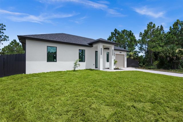 1039 BASSINGER AVENUE S, Lehigh Acres, FL 33974