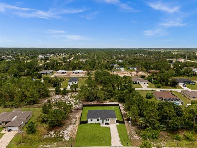 1039 BASSINGER AVENUE S, Lehigh Acres, FL 33974